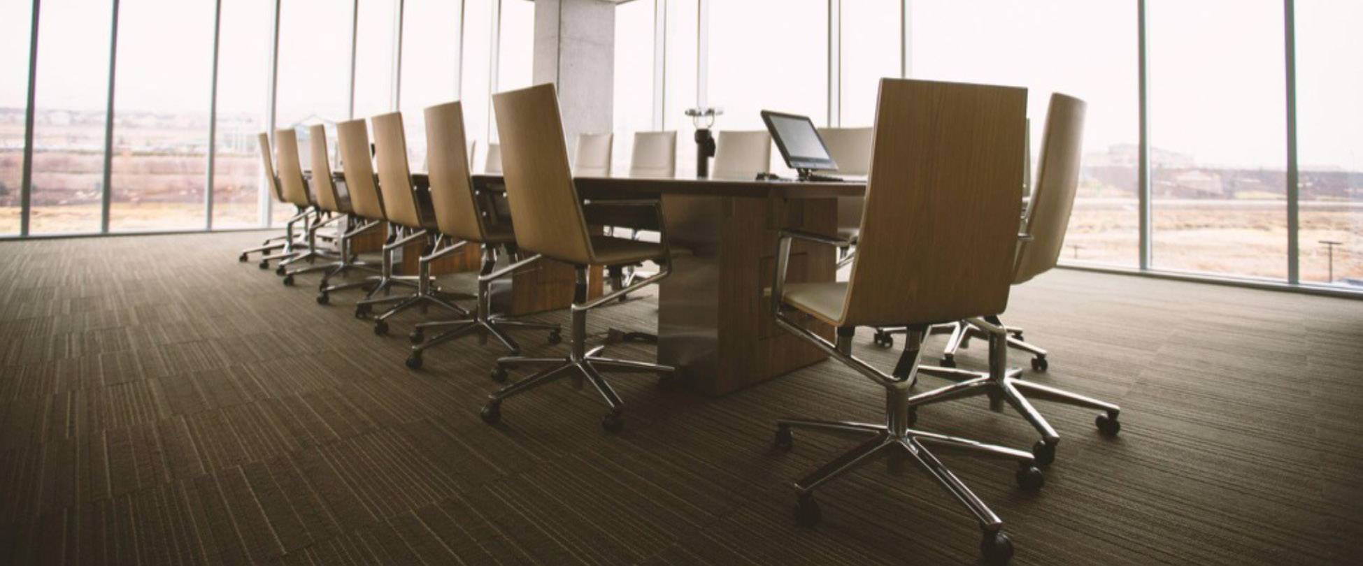 Empty boardroom illustrating ceo executive search and board-level hiring decisions